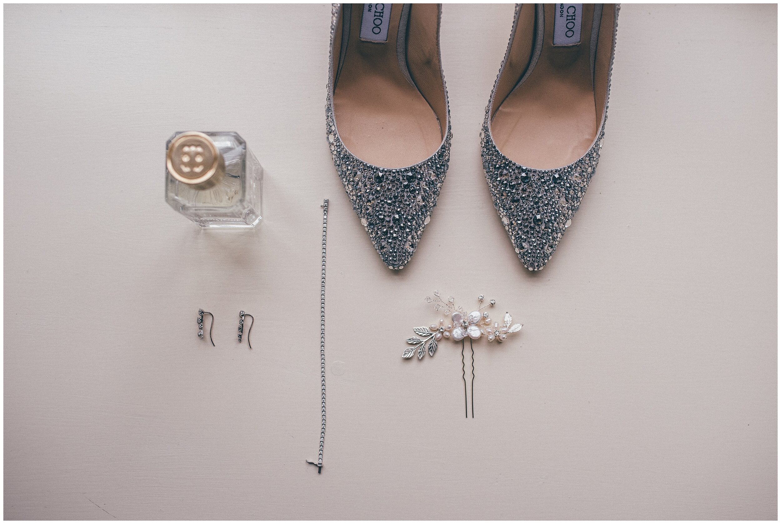 Beautiful Jimmy Choo wedding shoes and other wedding details at Lake District wedding.