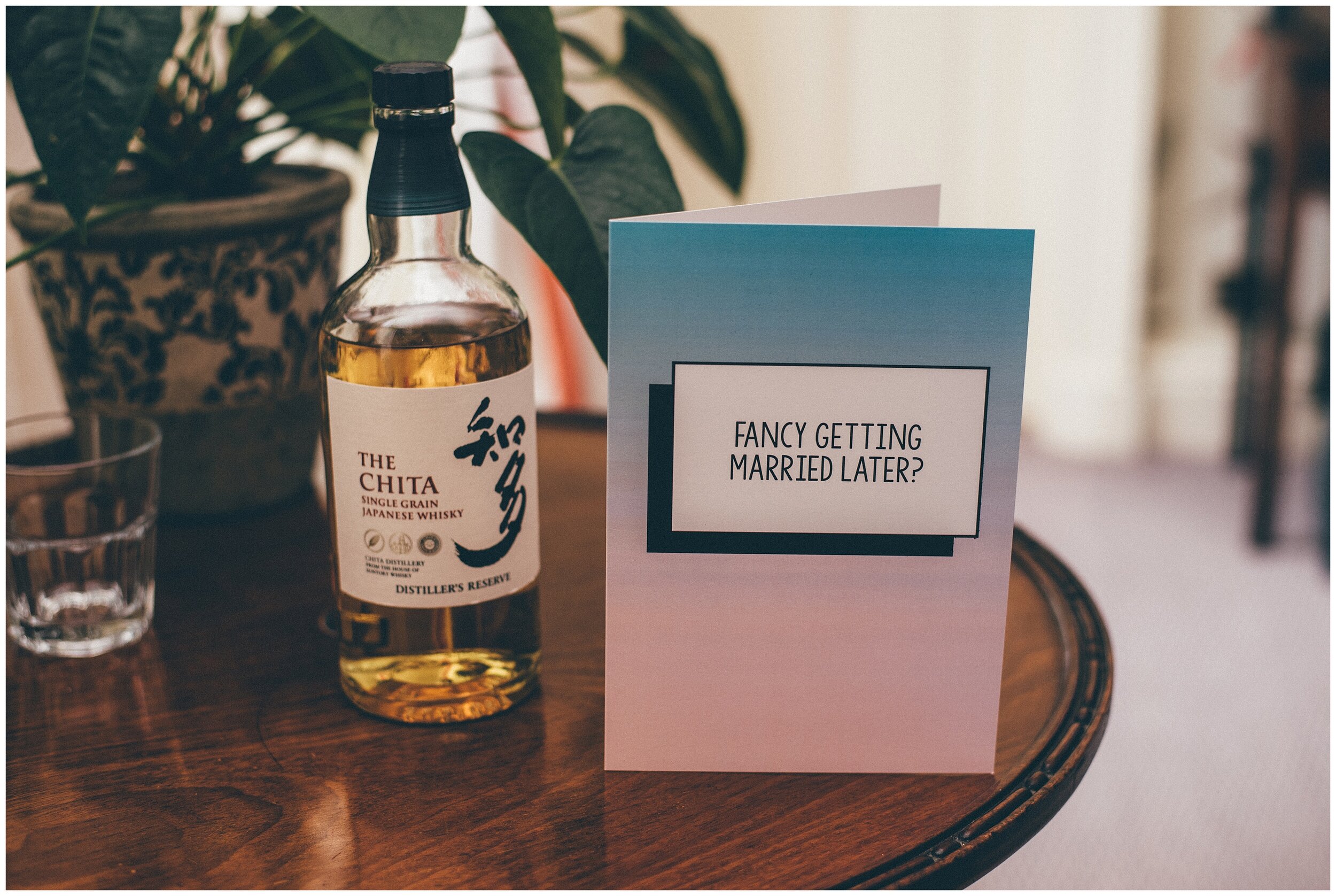 Grooms wedding card and whisky that he shared with his Best Man.