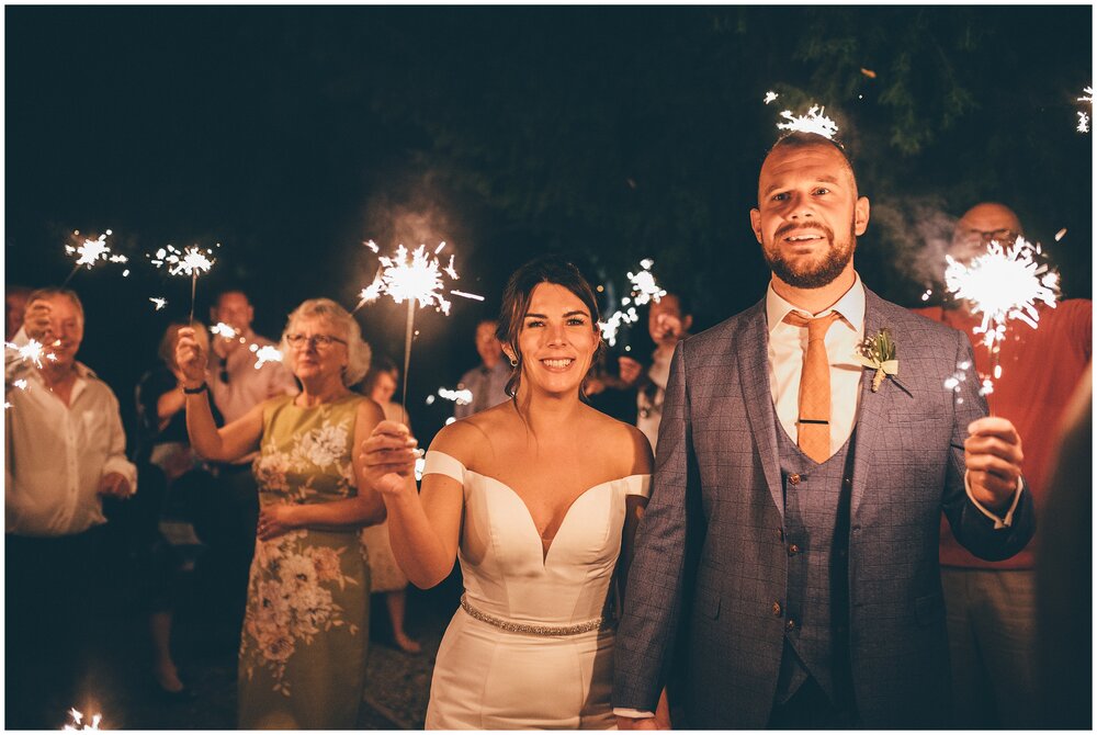 Sparklers at Lake Garda destination wedding, in Villa Bissiniga at Salo in Lake Garda.