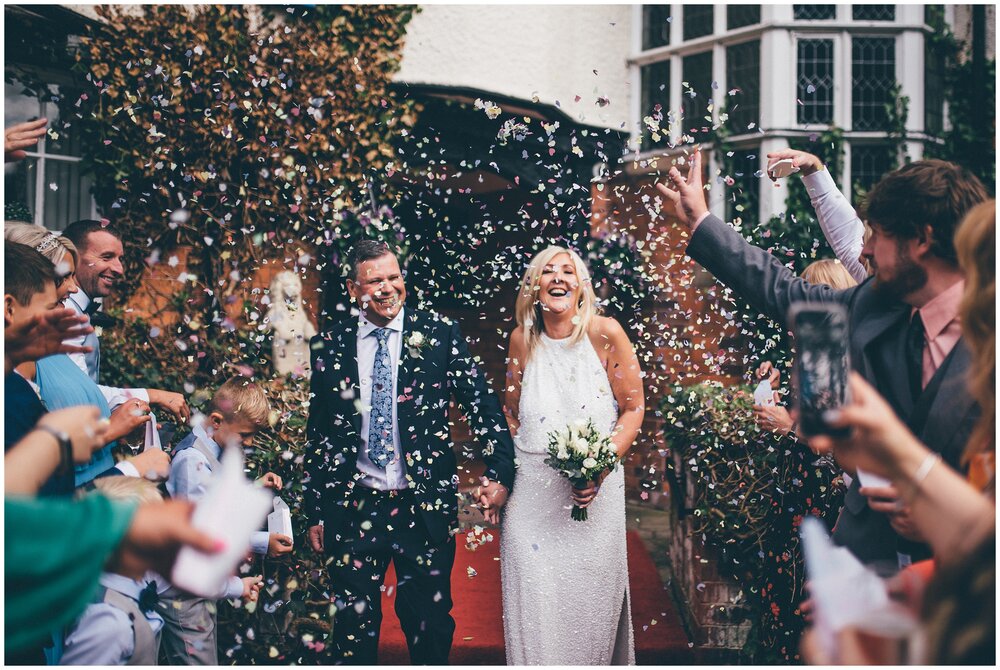 Incredible confetti throwing at Mere Court Hotel in Cheshire.