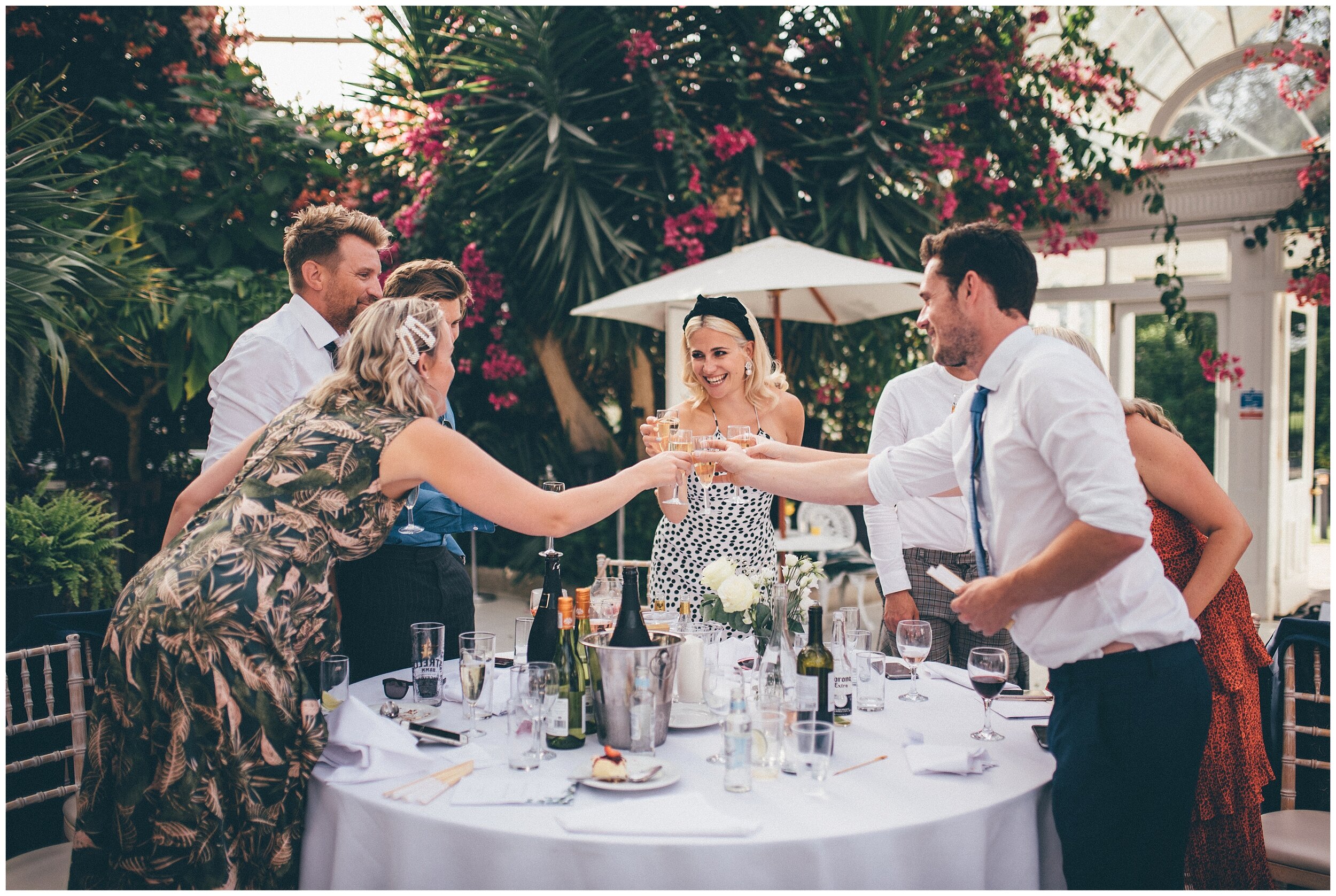 Pixie Lott and other wedding guests cheers after the speeches at Sefton Palm House.