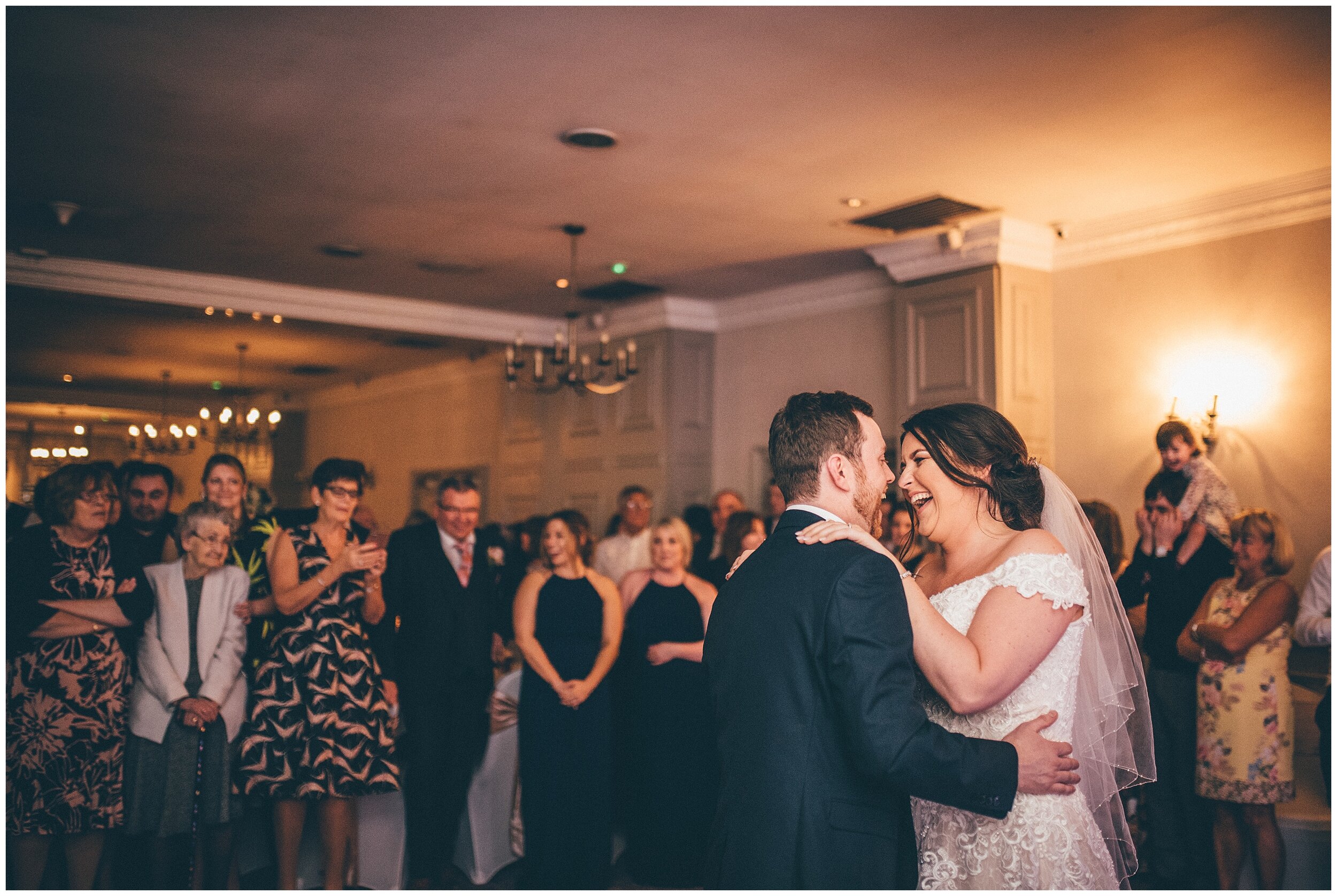 Newlyweds dancing to their First Dance at Mottram Hall.