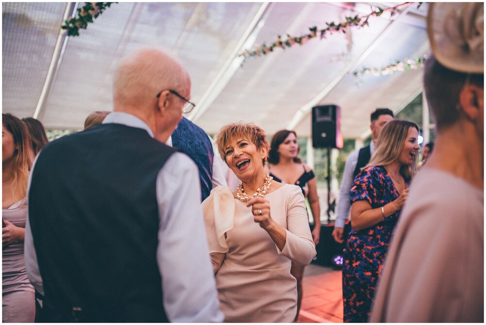 Dancing wedding guests at Abbeywood Estate in Cheshire.