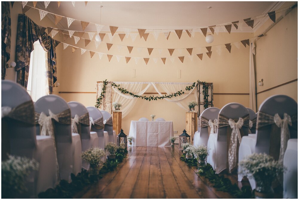 Rustic wedding aisle in Cheshire wedding venue.