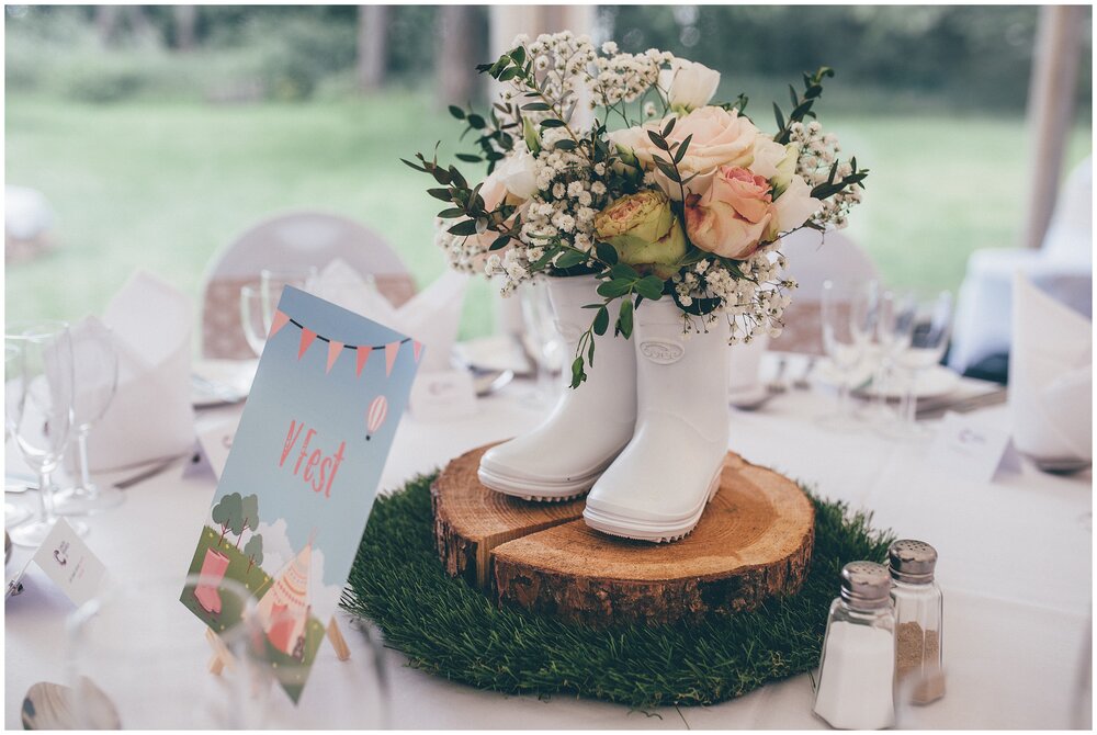 Festival themed rustic wedding centrepieces.