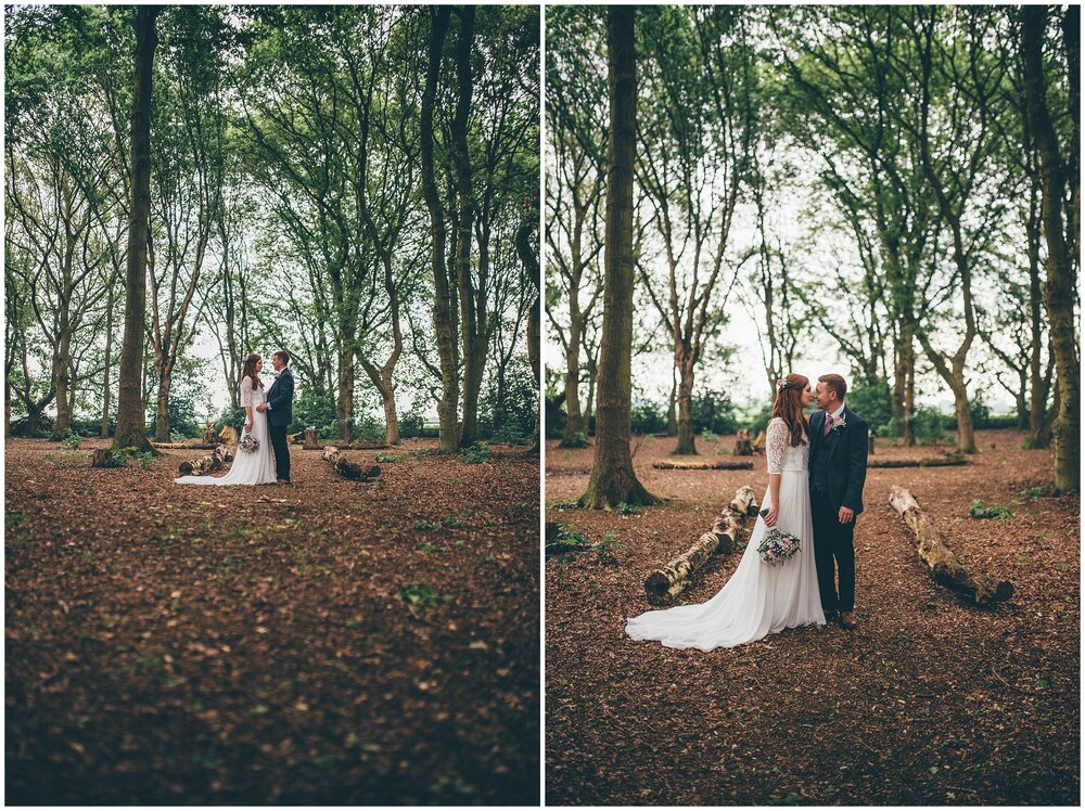 Bride and groom have their wedding portraits taken in Cheshire woodlands.