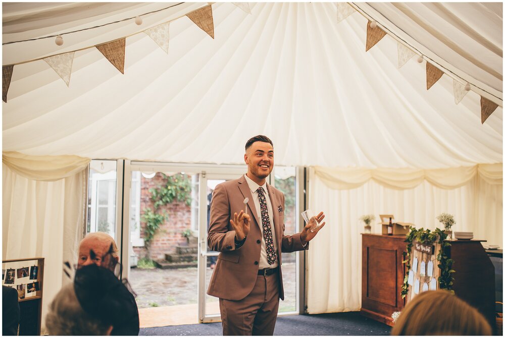 Bride's friend announces bride and groom into the wedding breakfast at Cheshire wedding venue.