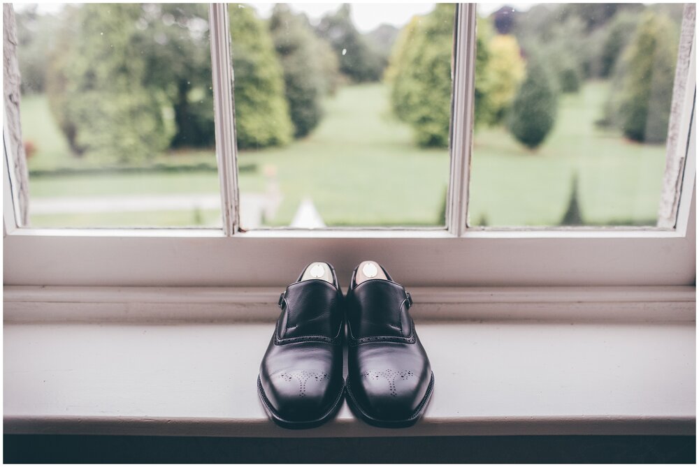 Grooms shoes on the window sill in the suite at Lemore Manor.