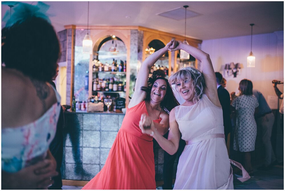 Wedding guests party and dance at Lemore Manor.