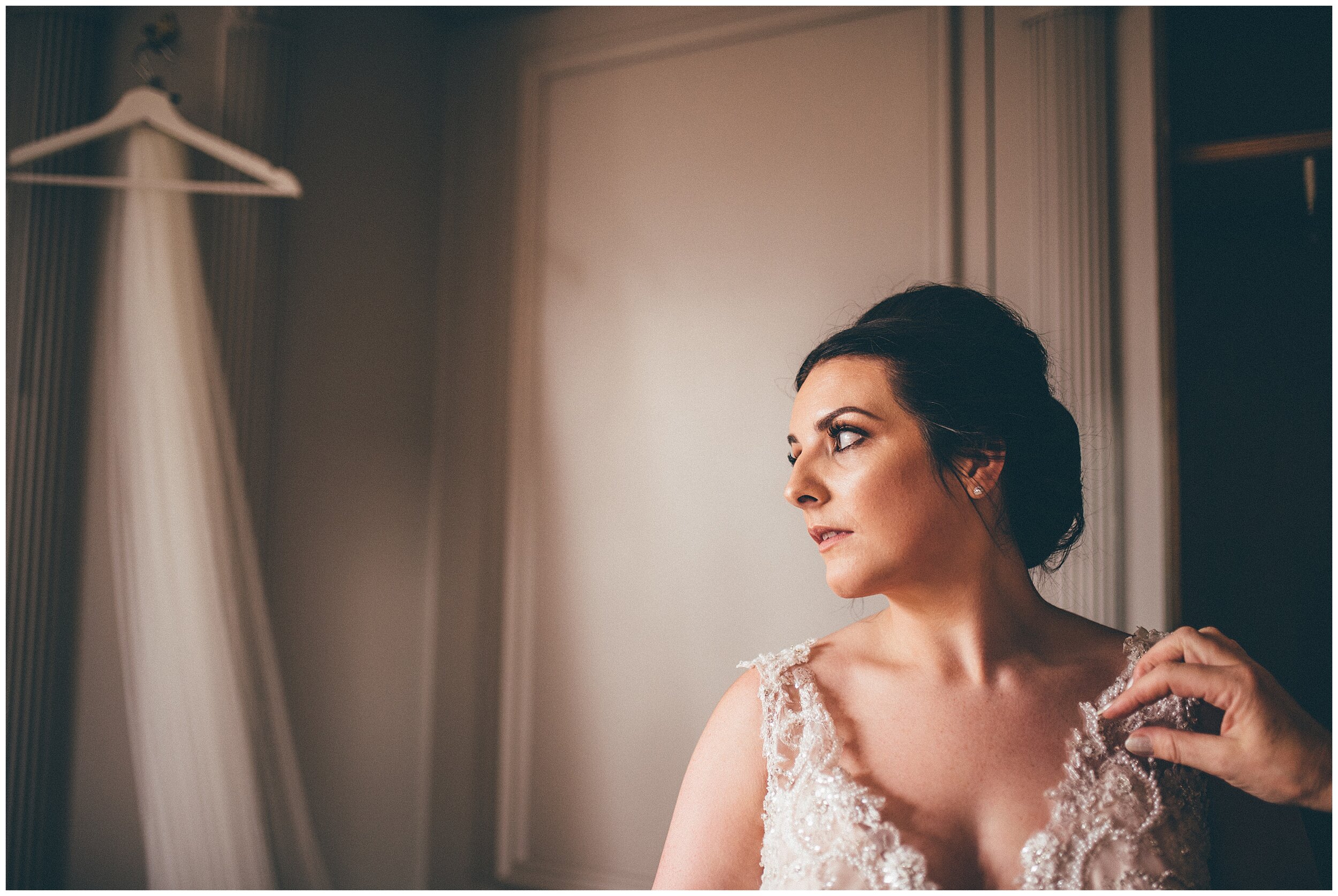Bride gets ready in the bridal suite at Cheshire summer wedding.