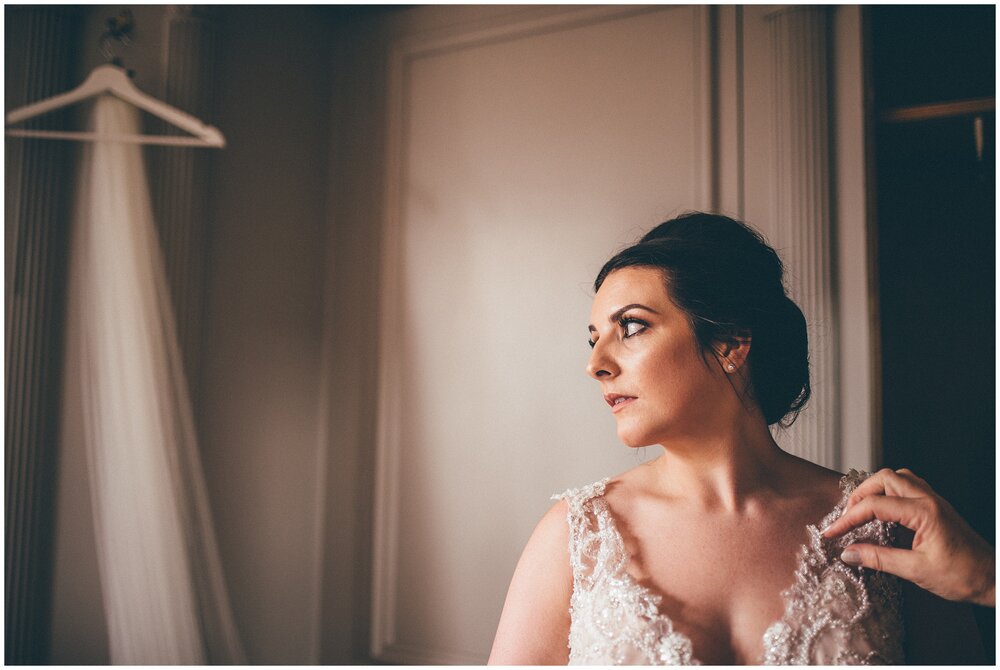 Bride gets ready in the bridal suite at Cheshire summer wedding.