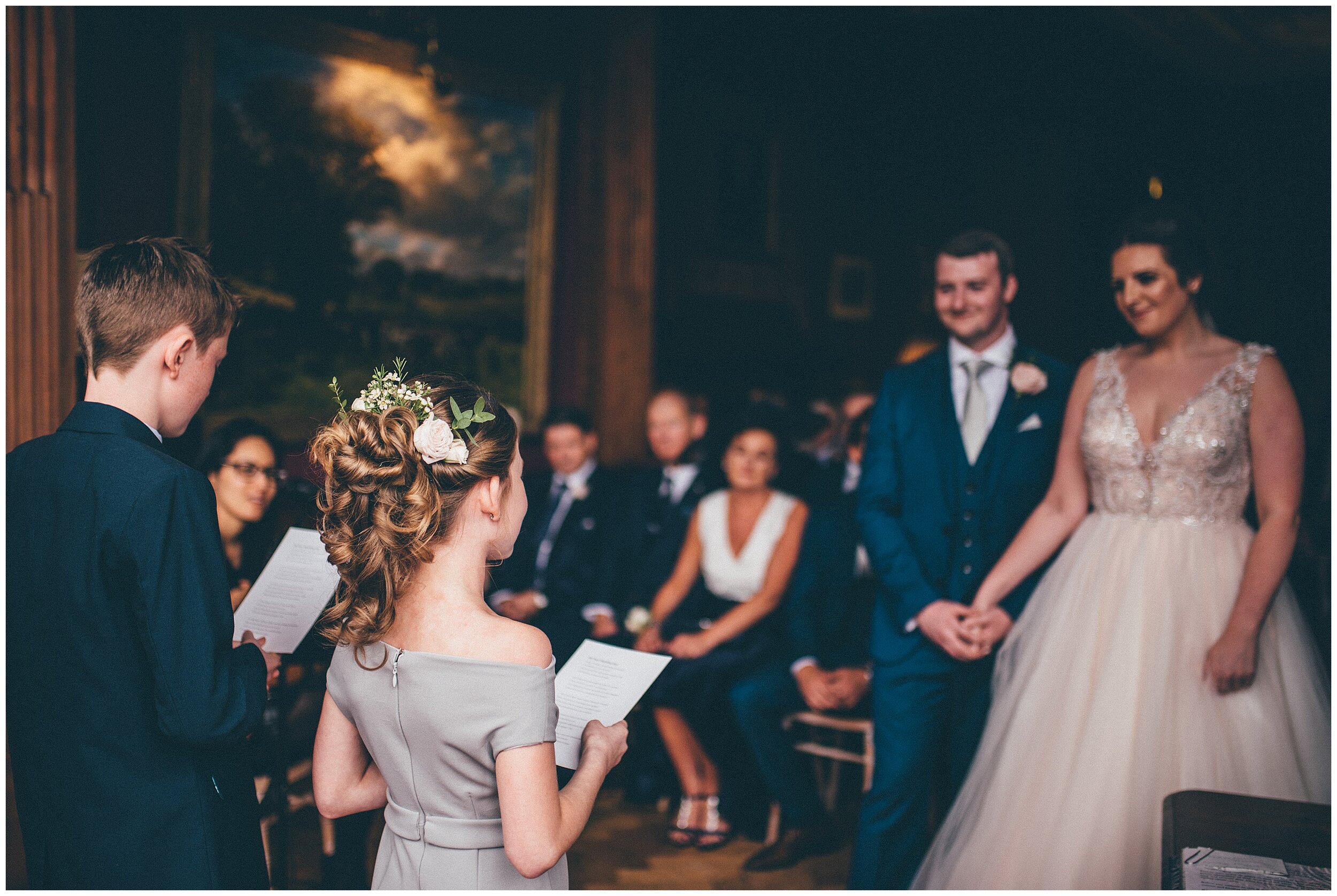 Laughter during the wedding ceremony at Thornton Manor in Cheshire.