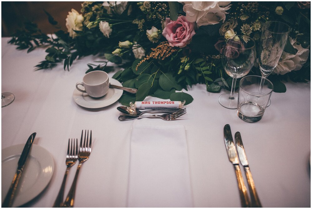 Gorgeous gin themed wedding breakfast room set up at Thornton Manor, with personalised Love Heart sweets.