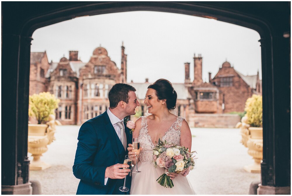 Couple portraits at Cheshire wedding venue, by wirral wedding photographer at Thornton Manor.