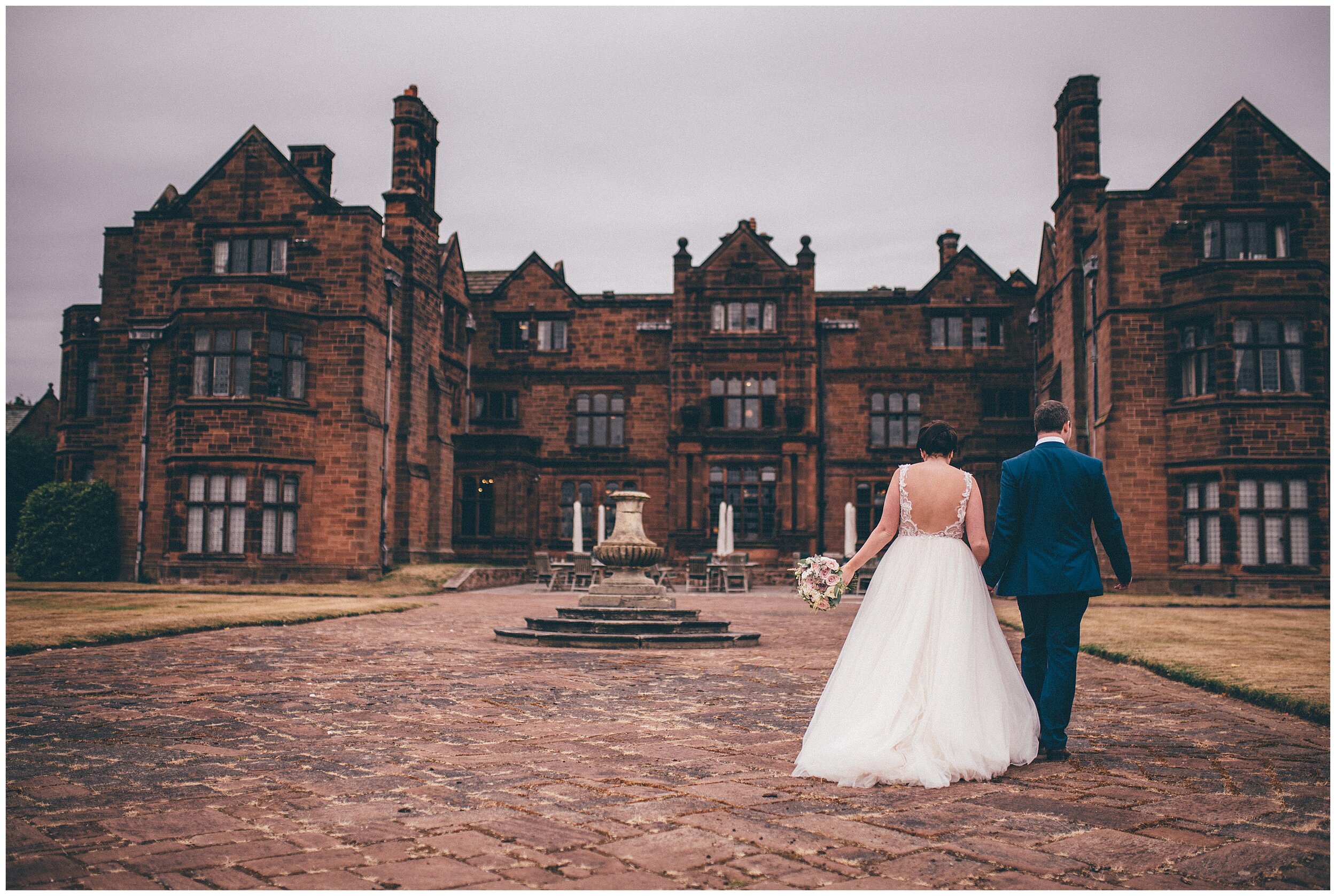 Couple portraits at Cheshire wedding venue, by wirral wedding photographer at Thornton Manor.