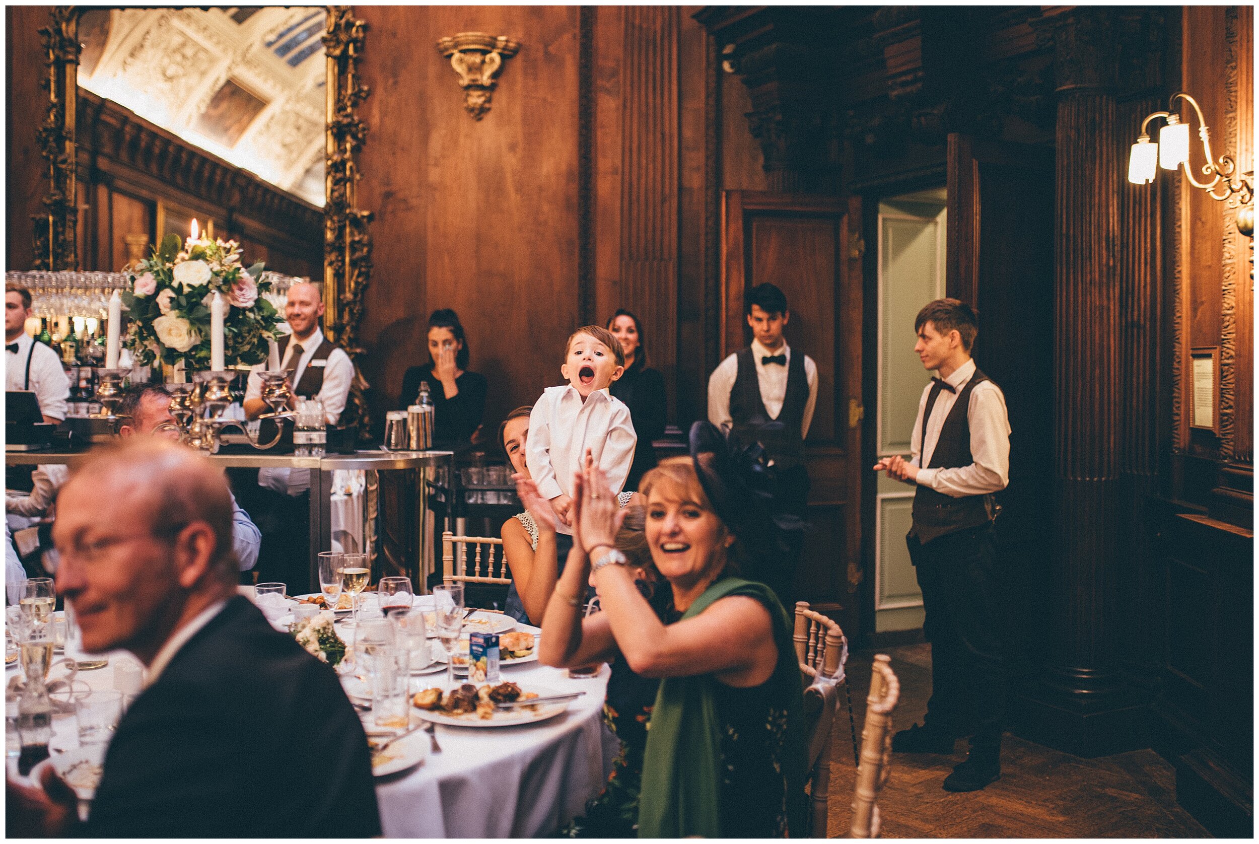 Wedding party enjoy Cheshire singing waiters at Thornton Manor summer wedding.Wedding party enjoy Cheshire singing waiters at Thornton Manor summer wedding.