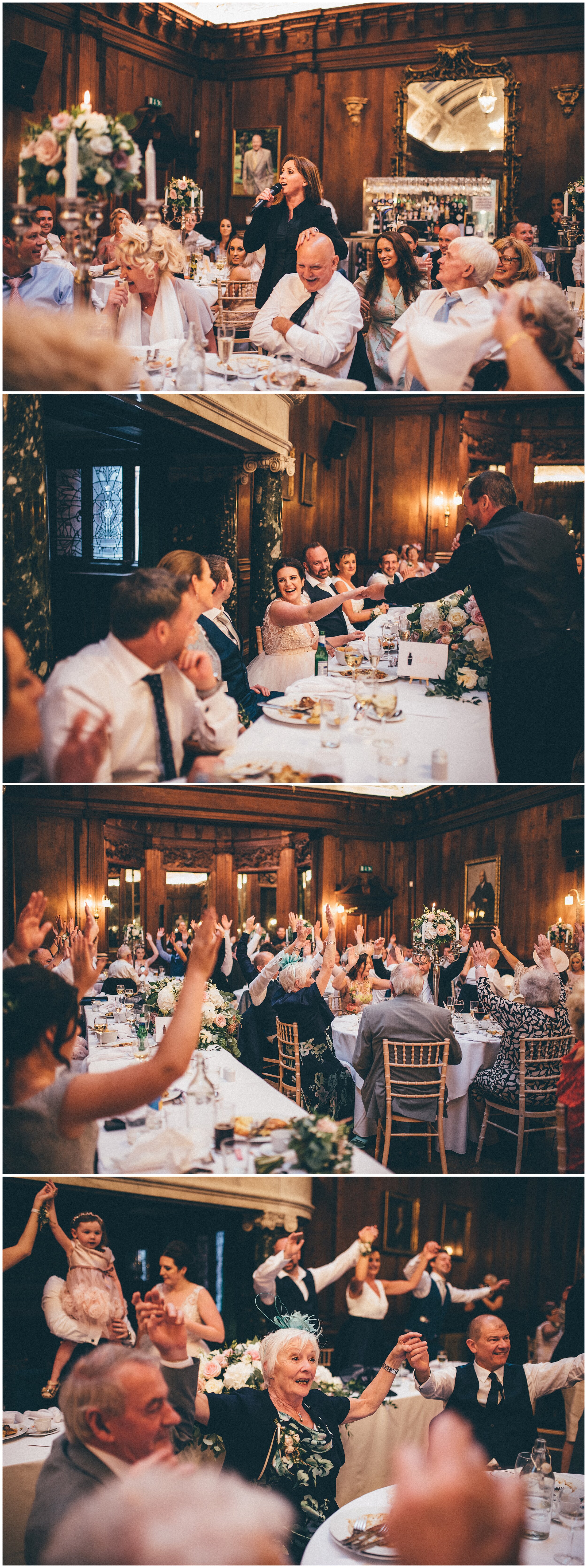 Wedding party enjoy Cheshire singing waiters at Thornton Manor summer wedding.