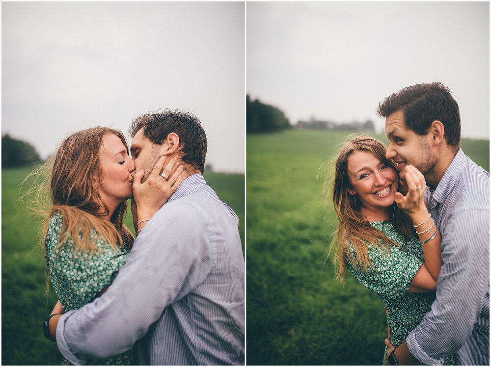 Natural and happy young couple have their  photoshoot in the rain storm.
