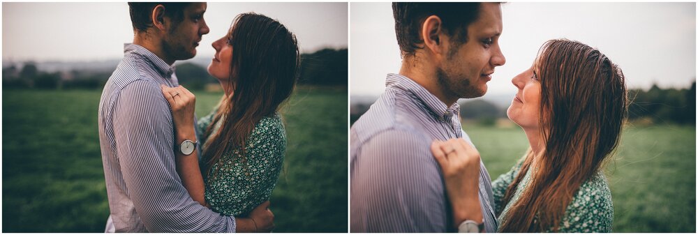 Golden hour as couple walk through Cheshire fields for rainy photoshoot.