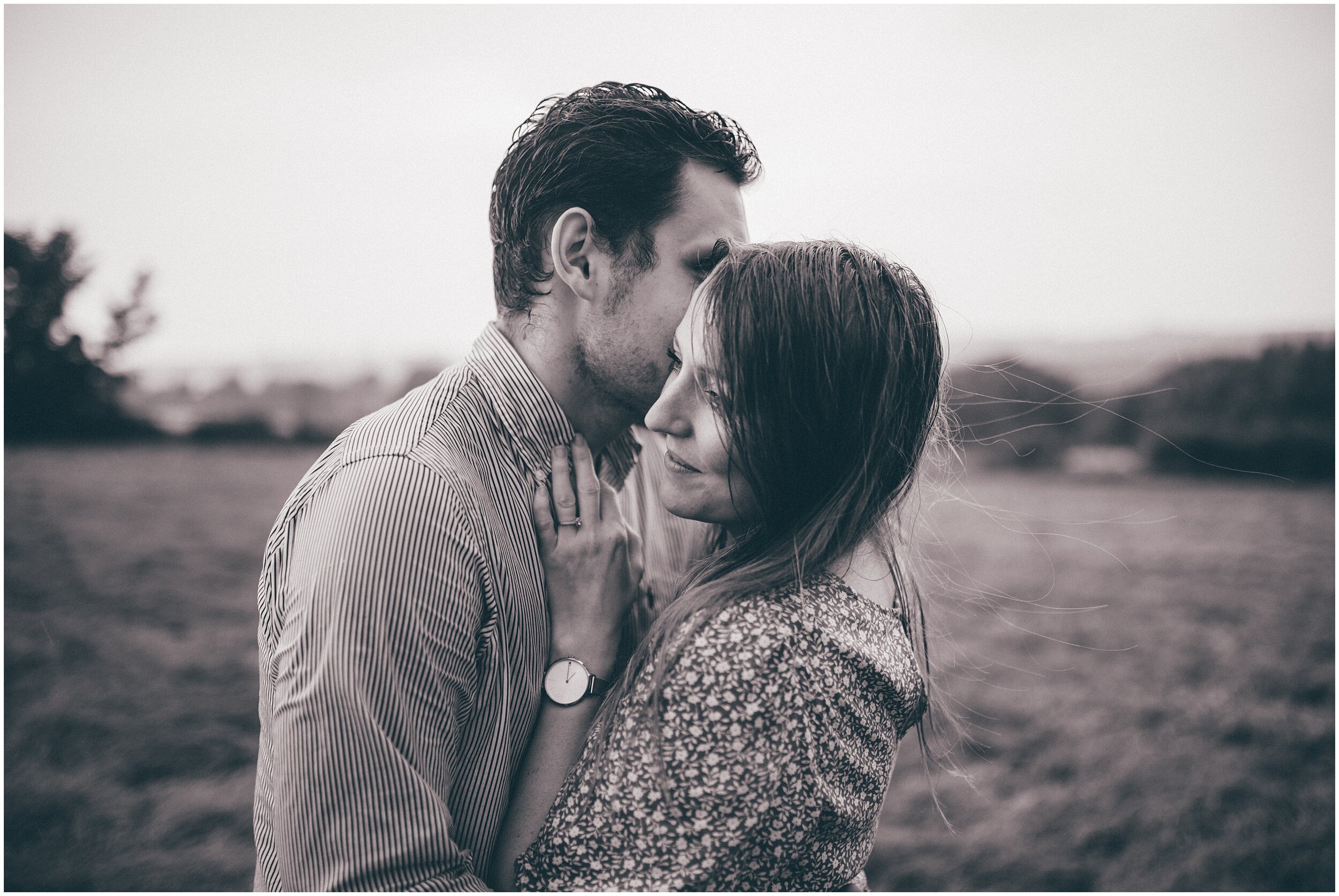 Romantic black and white photograph from thunderstorm photoshoot with young couple.