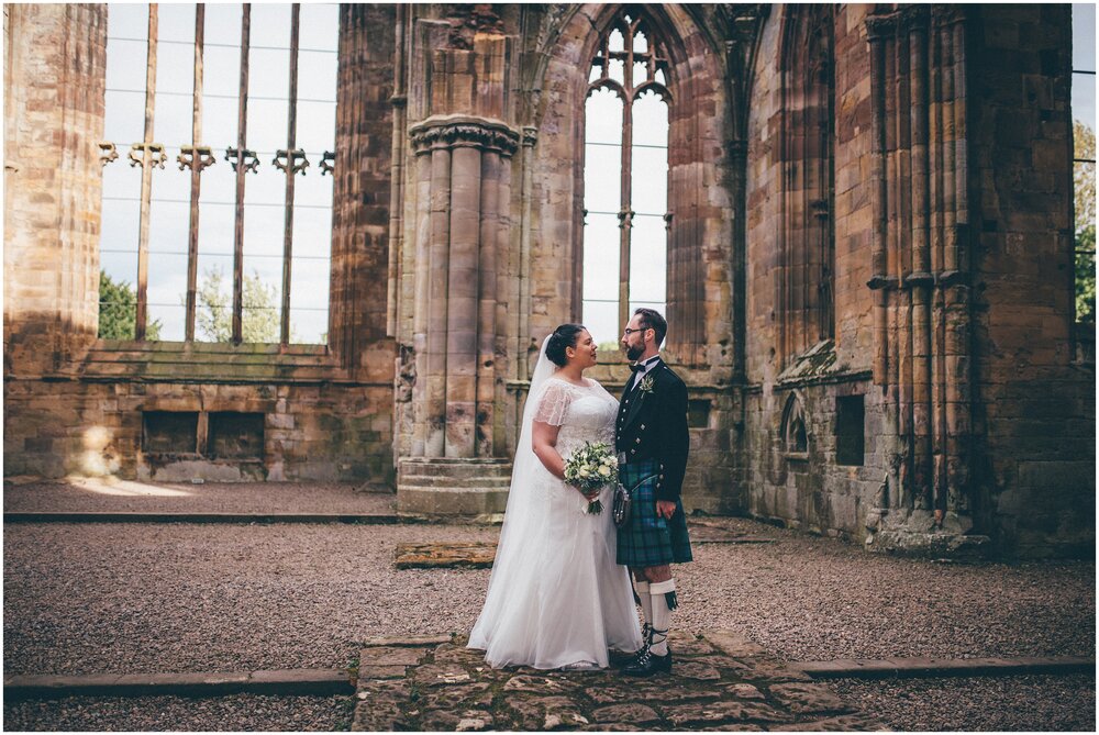 Wedding at a wedding in Melrose Abbey on Scottish Borders.