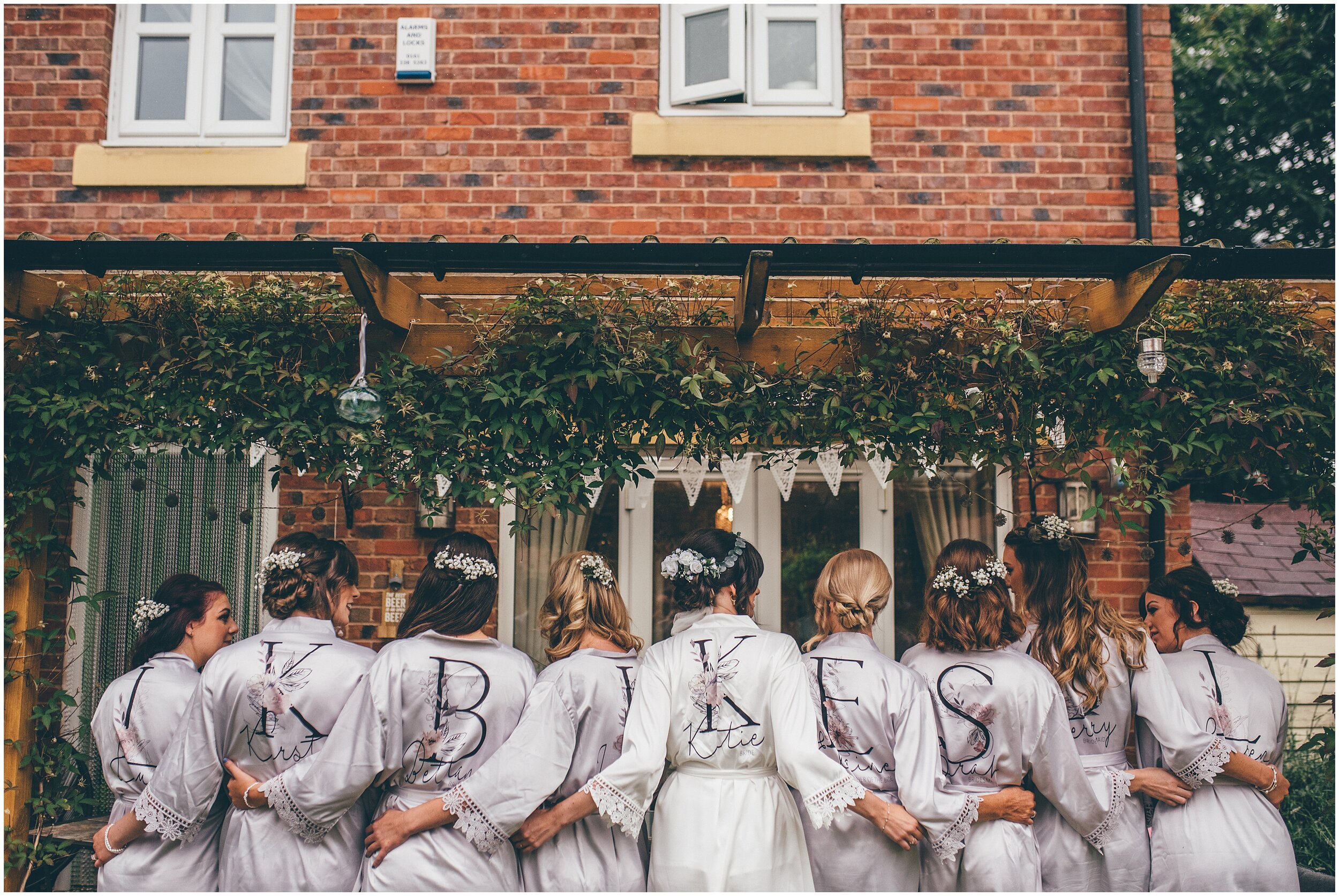 Bride and her bridesmaids in their personalised silk dressing gown robes.