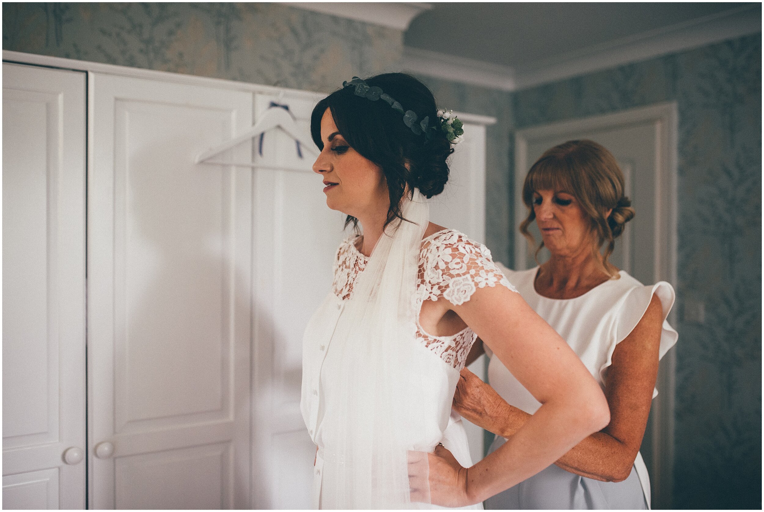 Bride's mum tastes her daughter into her wedding dress from Case of The Curious Bride.