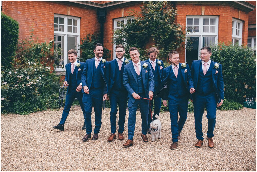Natural, relaxed photographs of the groomsmen and the dog before the wedding.