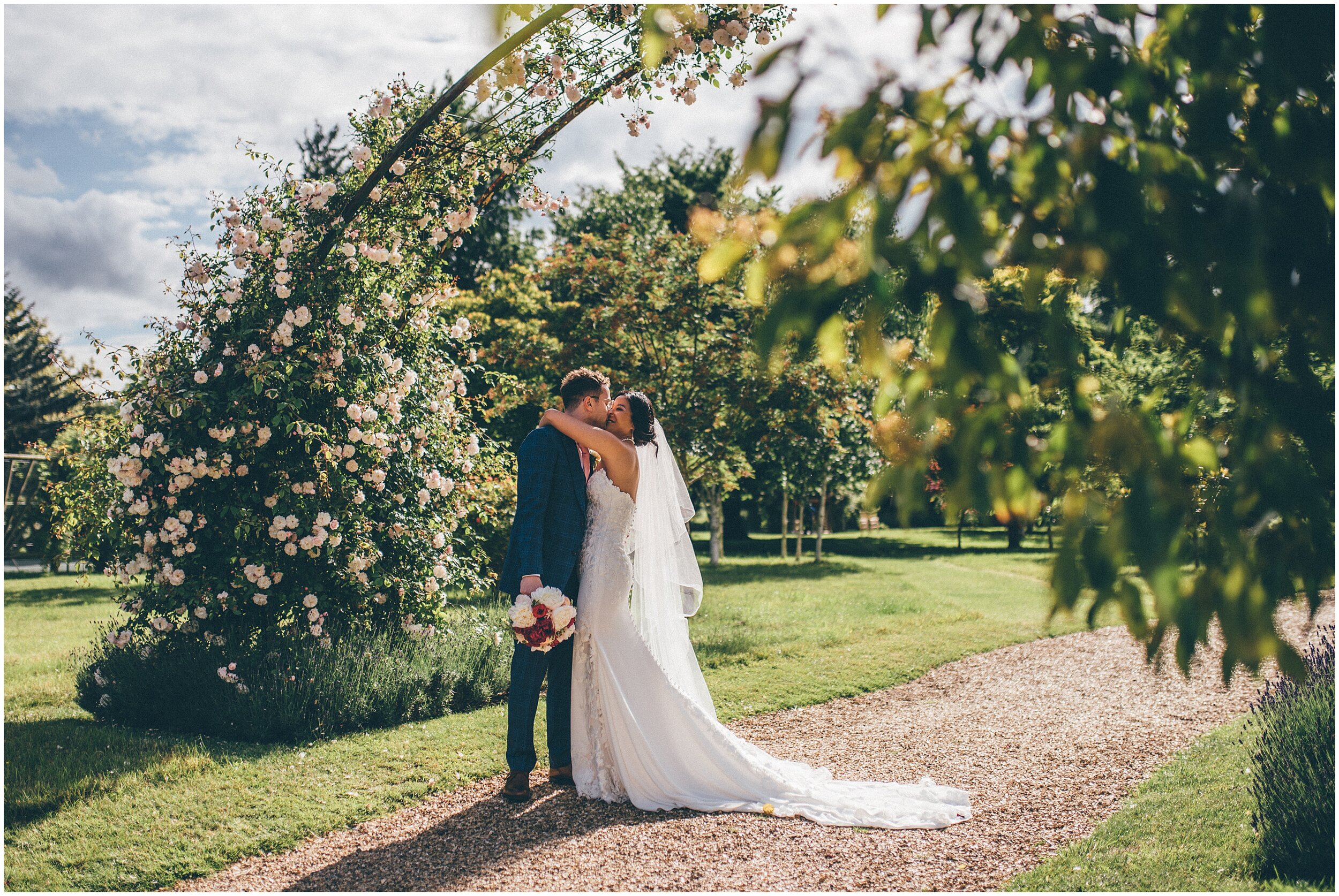 Cute and happy newlyweds at Chippenham Park Gardens.