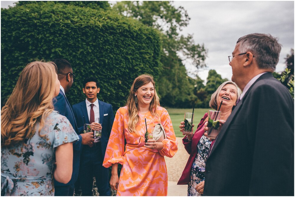 Relaxed and happy wedding guests at the Chippenham Park wedding reception.