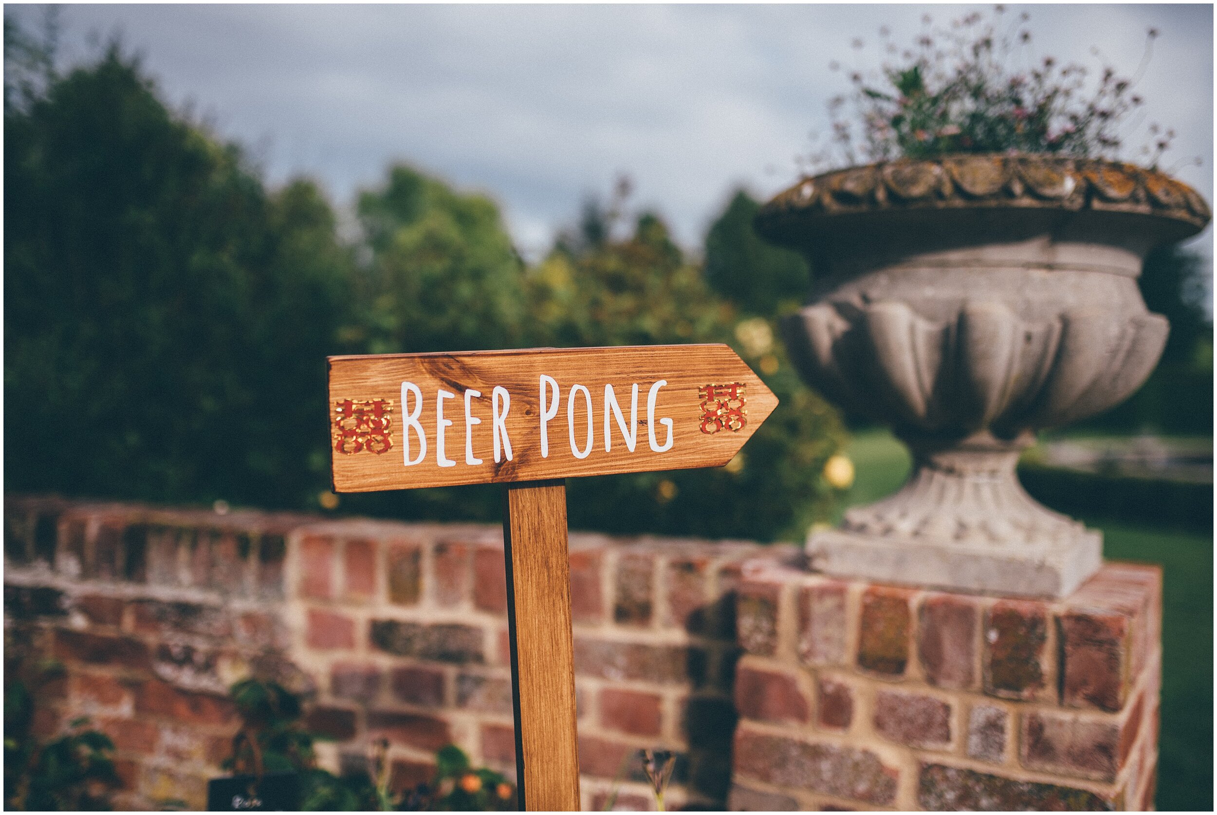 Beer pong wedding sign art outdoor wedding.