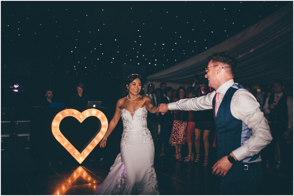 Bride and groom share their First Dance at Cheshire wedding venue.