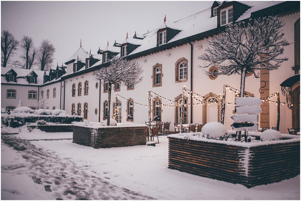 grounds of a snow covered castle in Luxembourg.