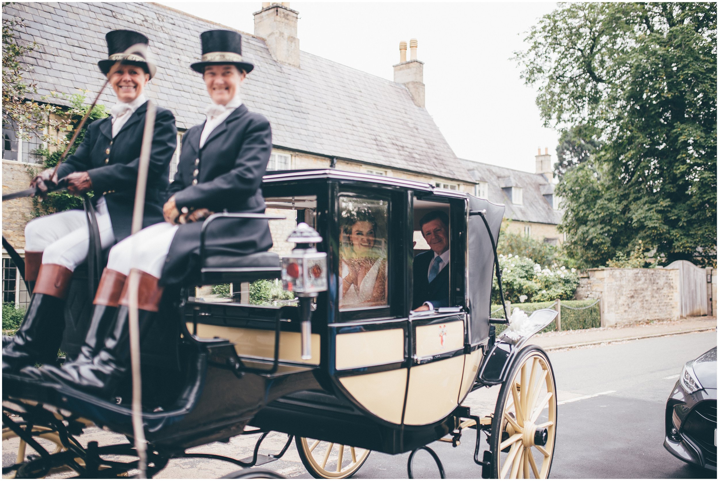 Bride arrives in horse drawn carriage.