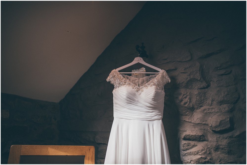 Wedding dress hung up at Tower Hill Barns in North Wales