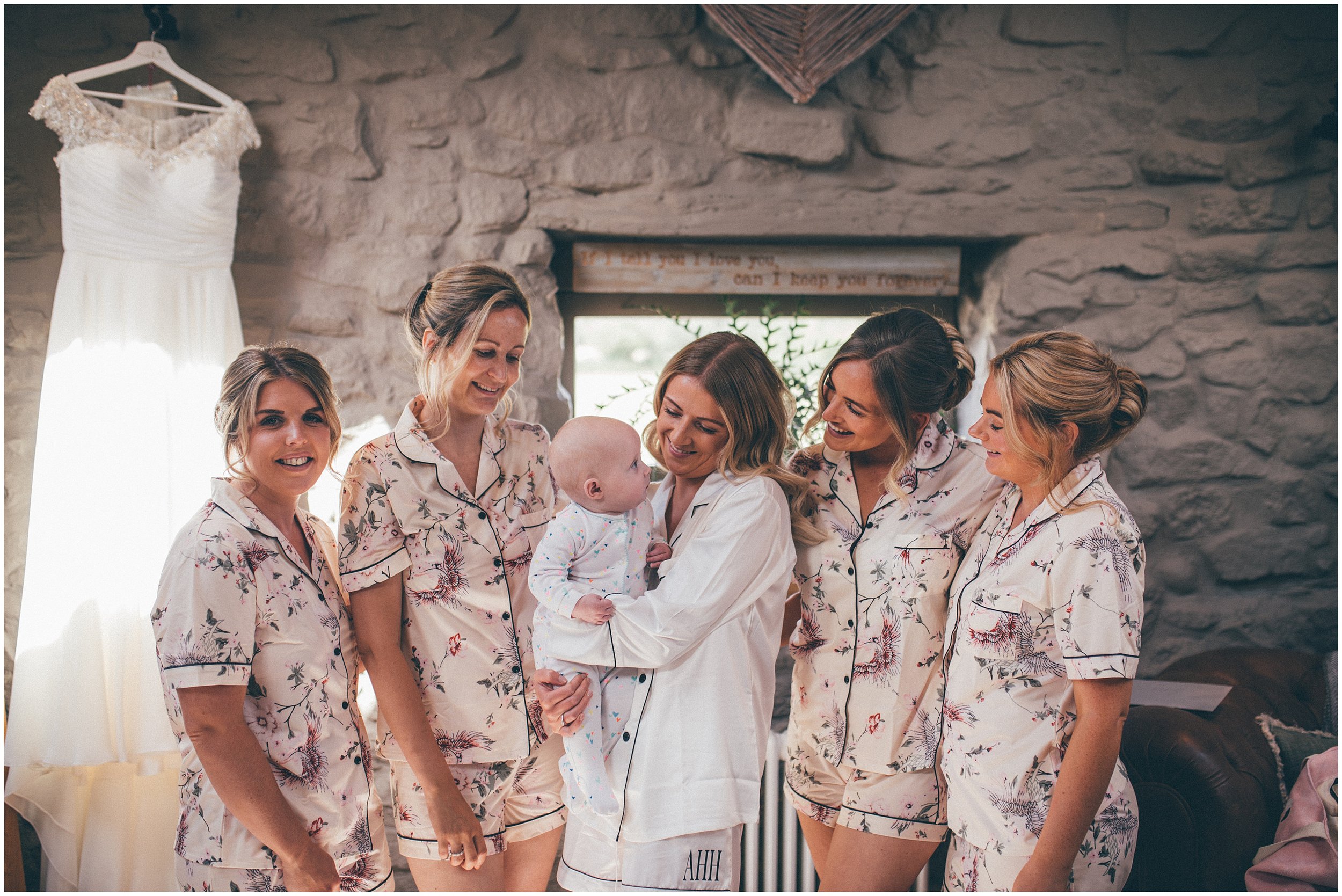 Bride and her bridesmaids at Tower Hill Barns in North Wales
