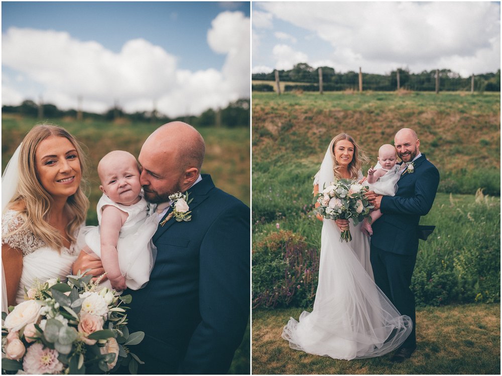 Bride and groom and their daughter at Tower Hill Barns in North Wales