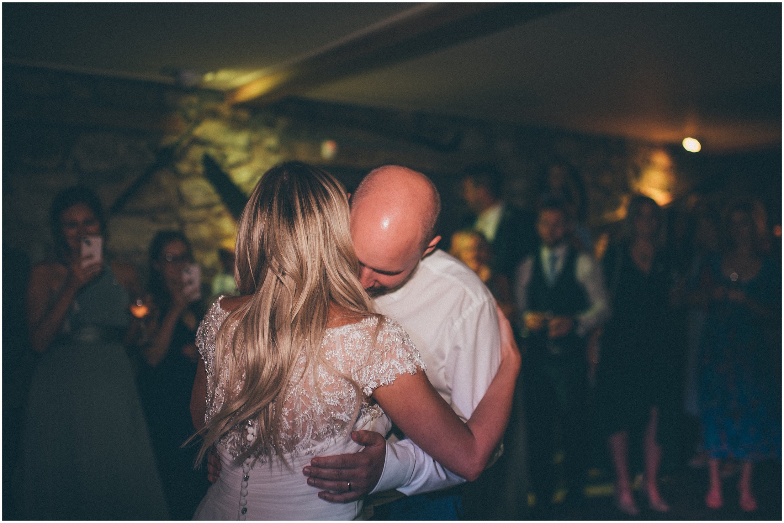 Wedding guests celebrate dancing at Tower Hill Barns in North Wales