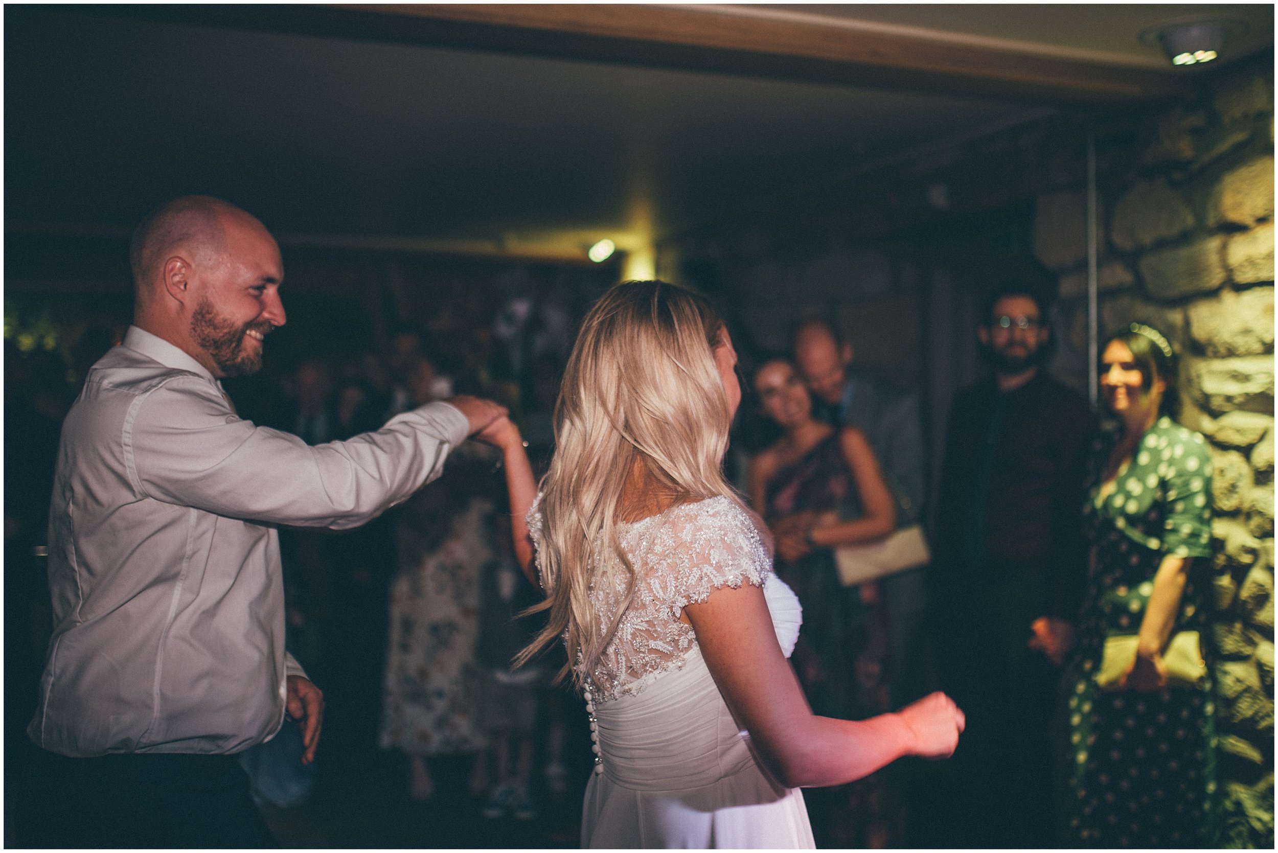 Wedding guests celebrate dancing at Tower Hill Barns in North Wales