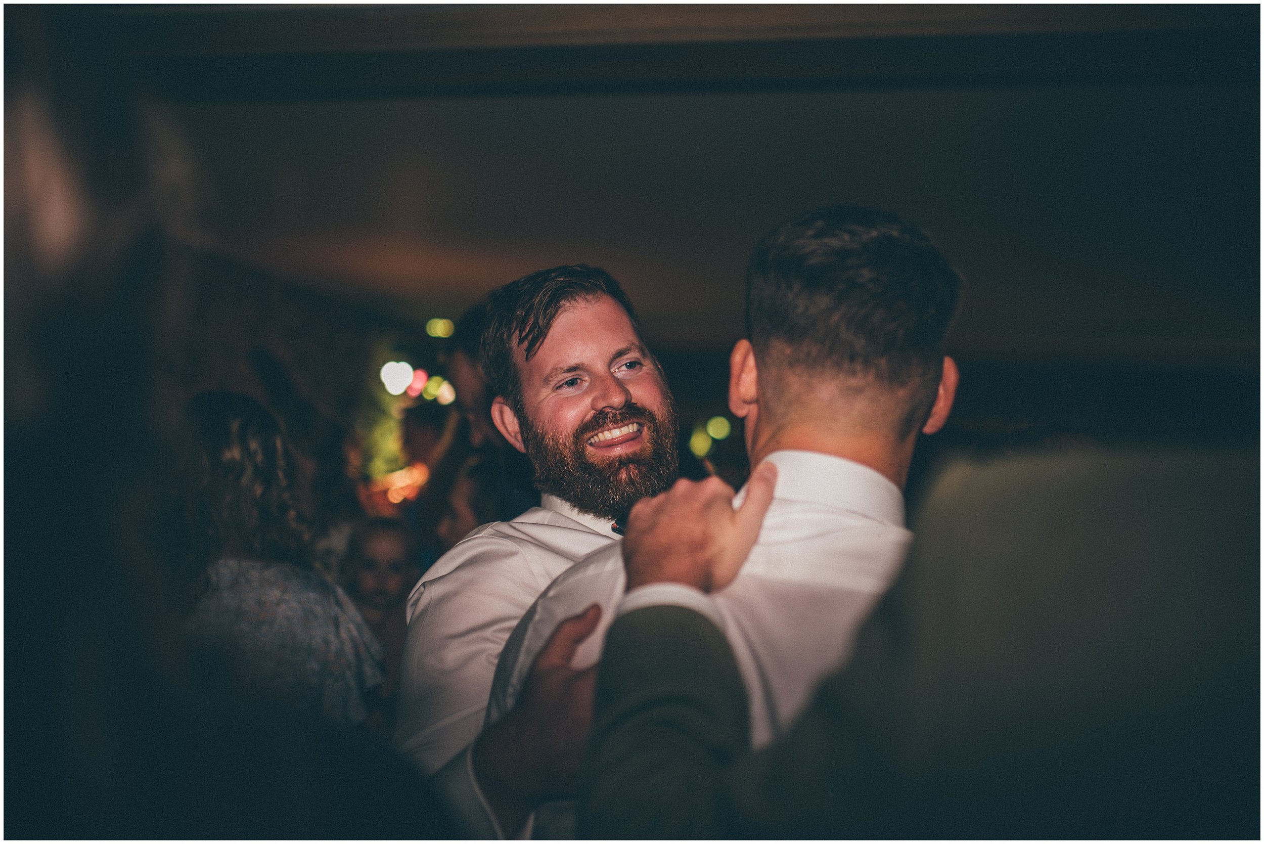 Wedding guests celebrate dancing at Tower Hill Barns in North Wales