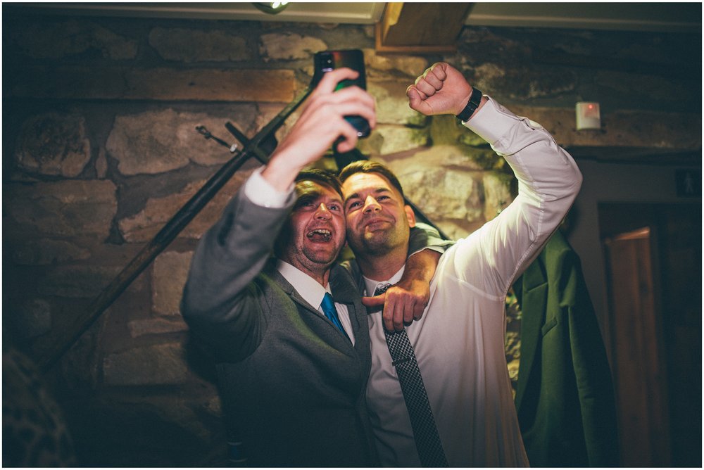 Wedding guests celebrate dancing at Tower Hill Barns in North Wales