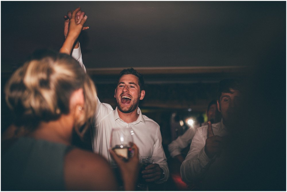 Wedding guests celebrate dancing at Tower Hill Barns in North Wales