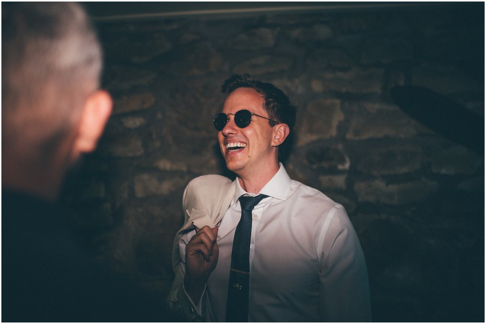 Wedding guests celebrate dancing at Tower Hill Barns in North Wales