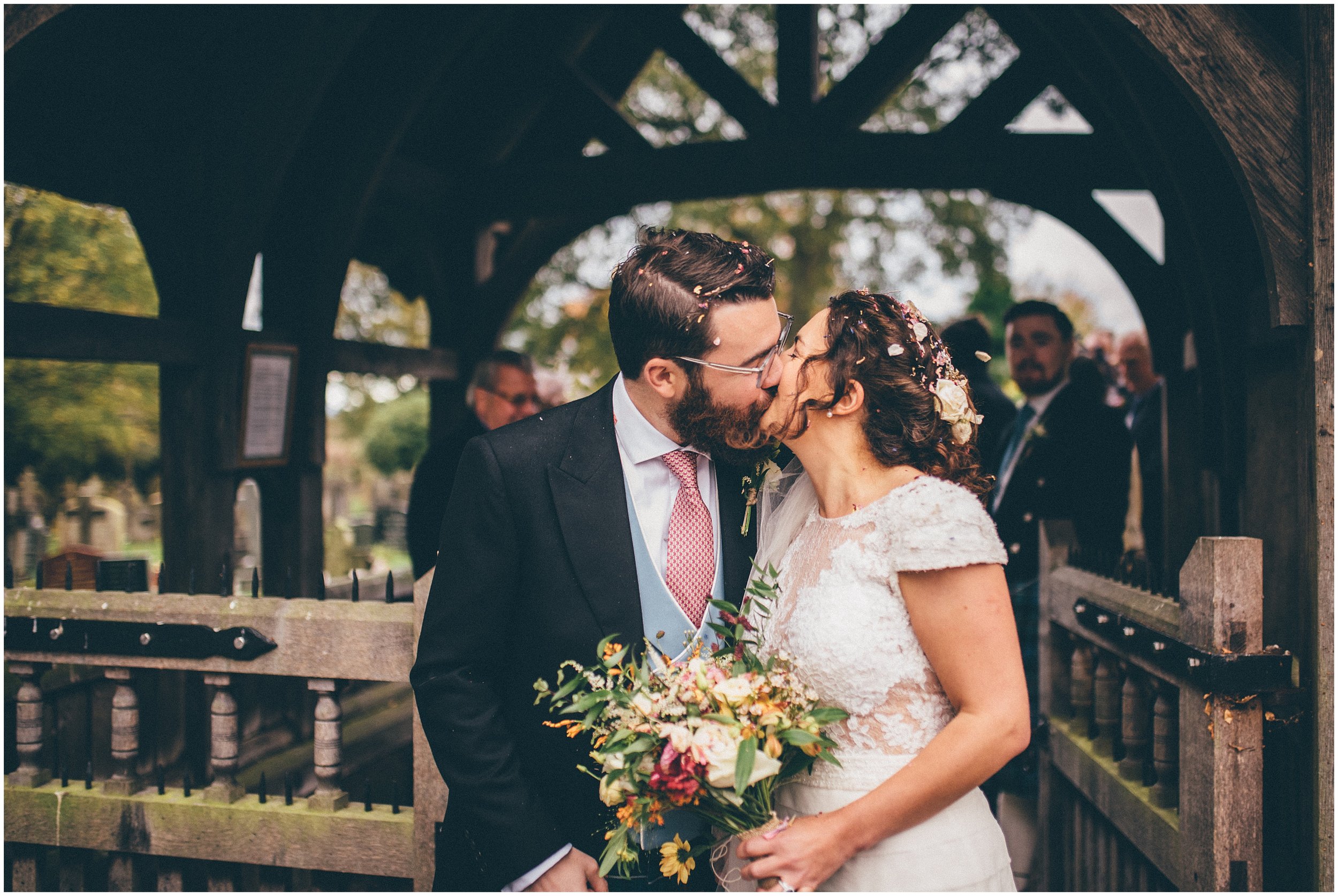 Bride and Groom kiss after their Cheshire wedding ceremony