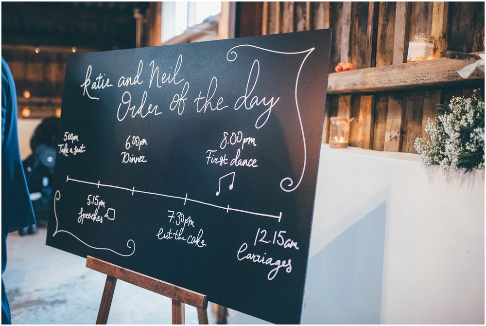 Order of the Day signage at Grange Barn wedding in Cheshire