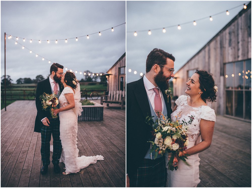 Bride and groom outside during twilight hour at Grange Barn wedding venue in Cheshire 