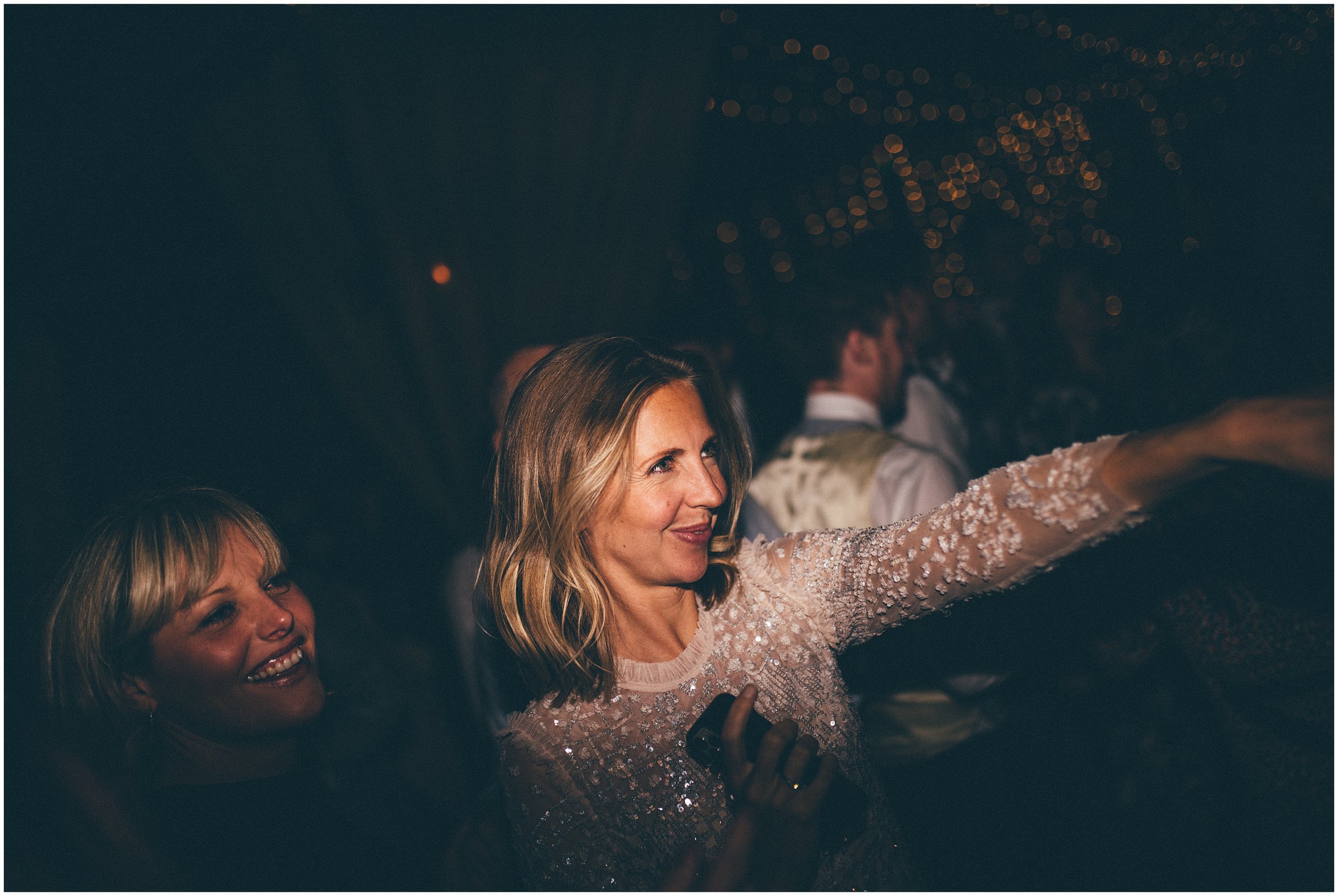 Wedding guests enjoy the dance floor at Grange Barn in Cheshire