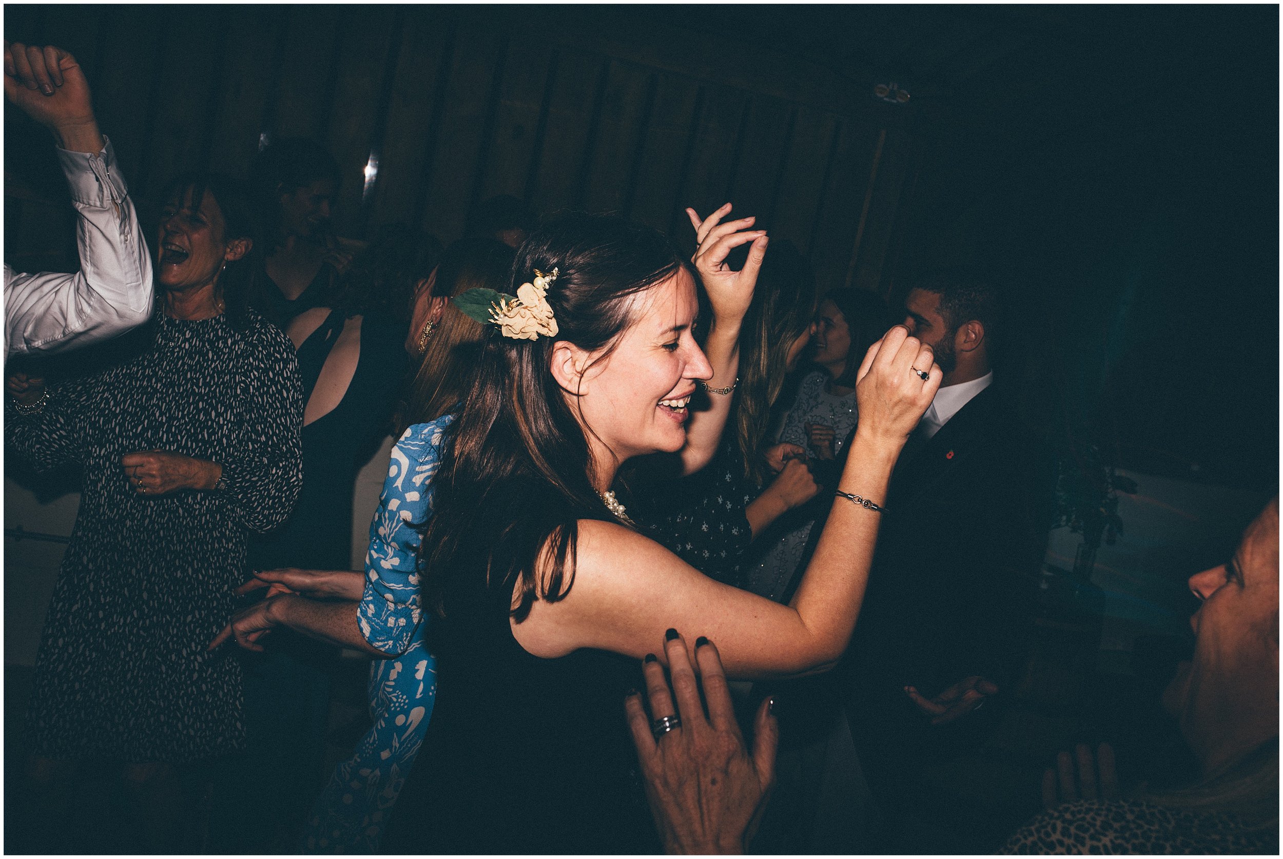 Wedding guests enjoy the dance floor at Grange Barn in Cheshire