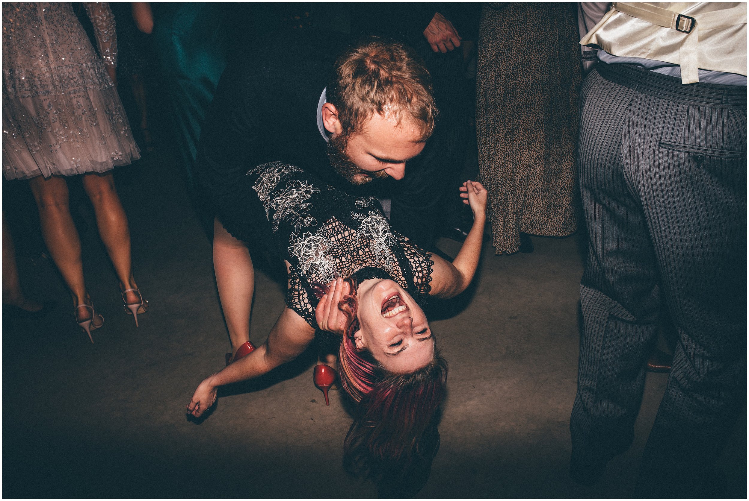 Wedding guests enjoy the dance floor at Grange Barn in Cheshire