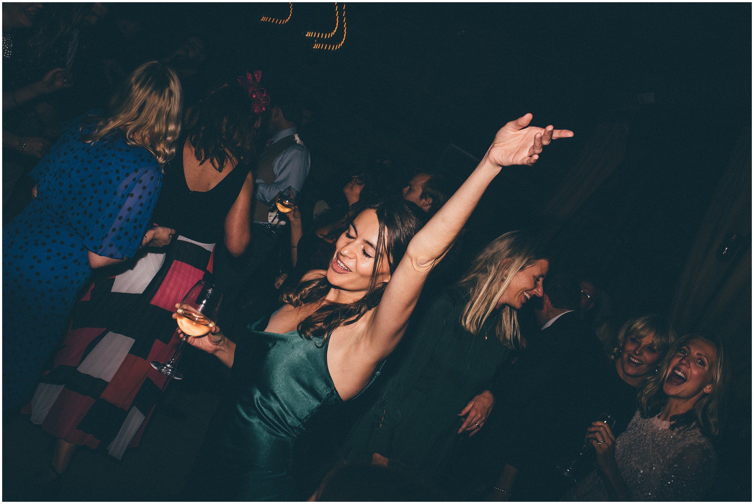 Wedding guests enjoy the dance floor at Grange Barn in Cheshire